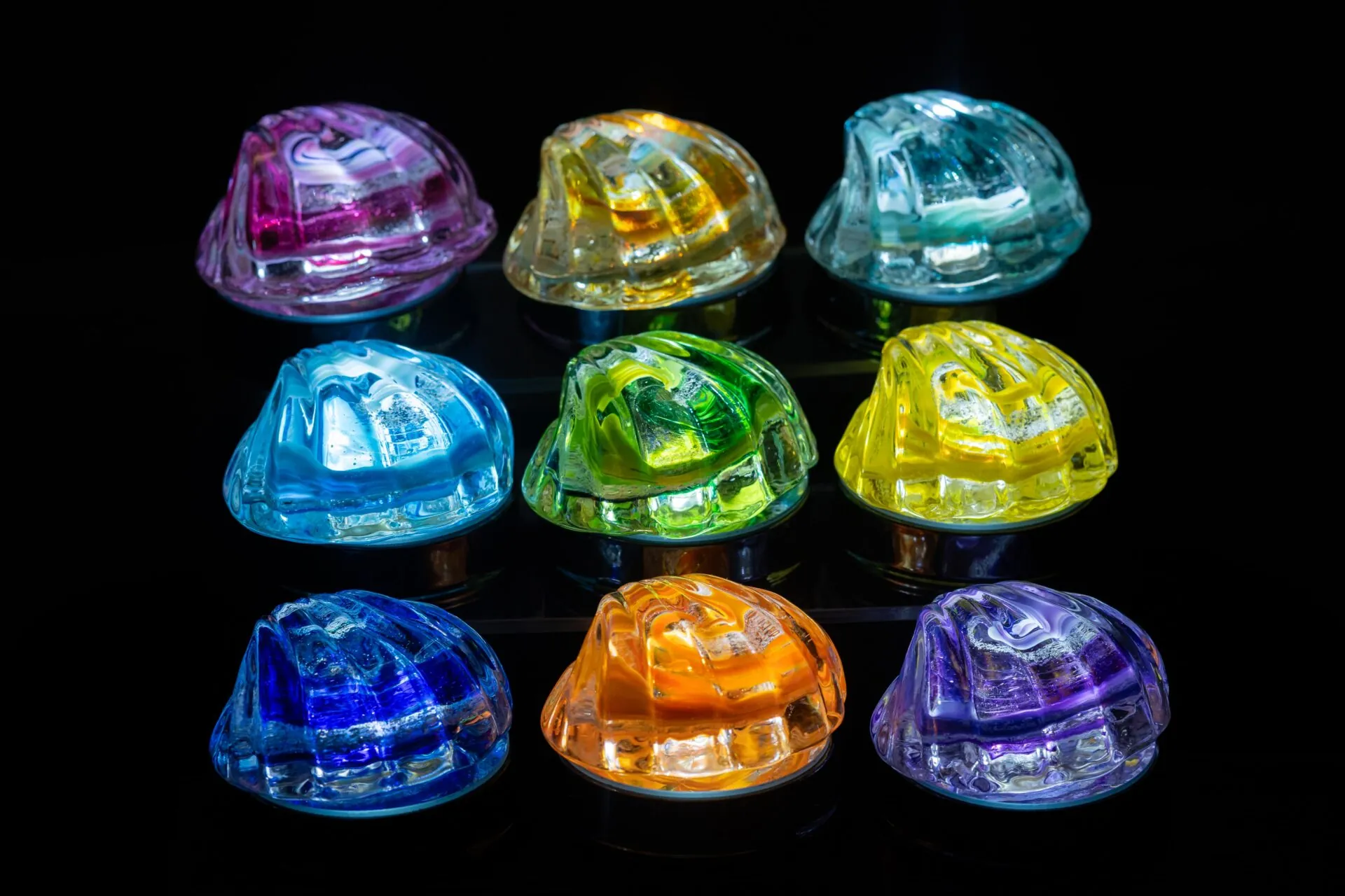 a group of colorful lights sitting on top of a table